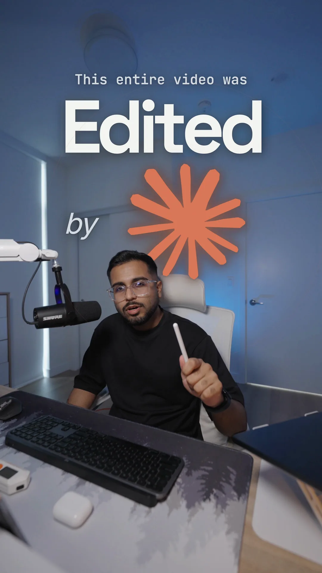 Ishan at his desk with the words 'This entire video was Edited by' and the Claude logo on the wall behind him